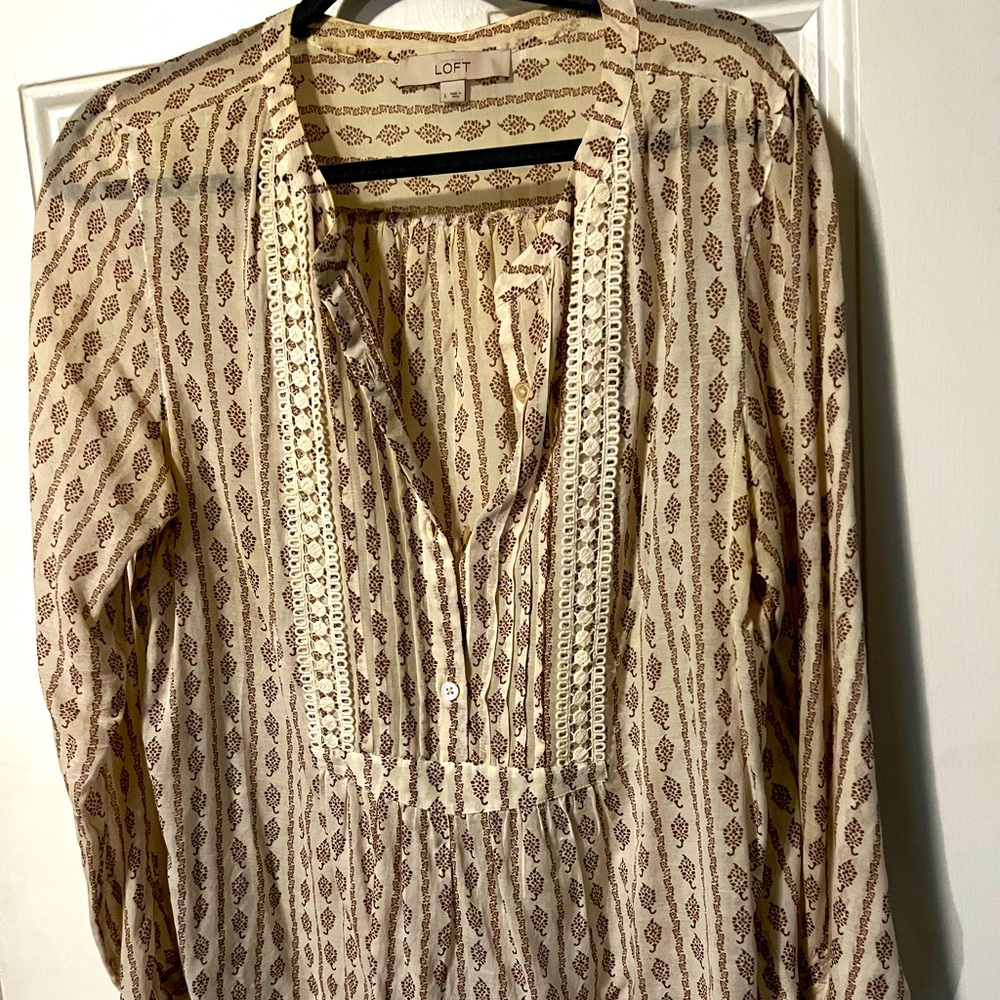 Gorgeous blouse with patterns and details